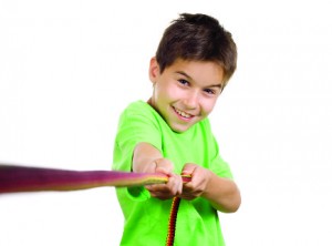 Boy pulling a rope